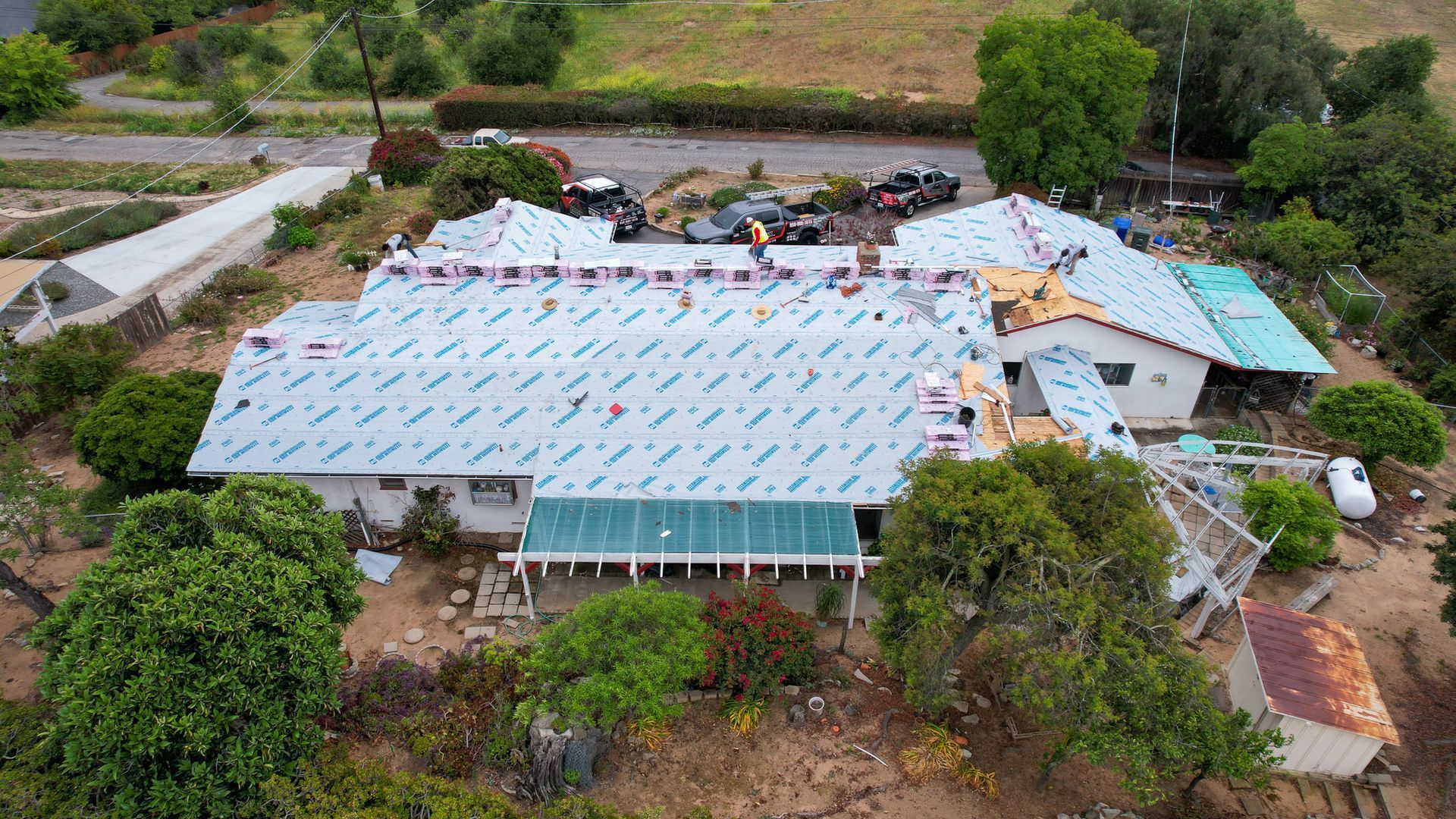 An aerial view of a house that is being remodeled