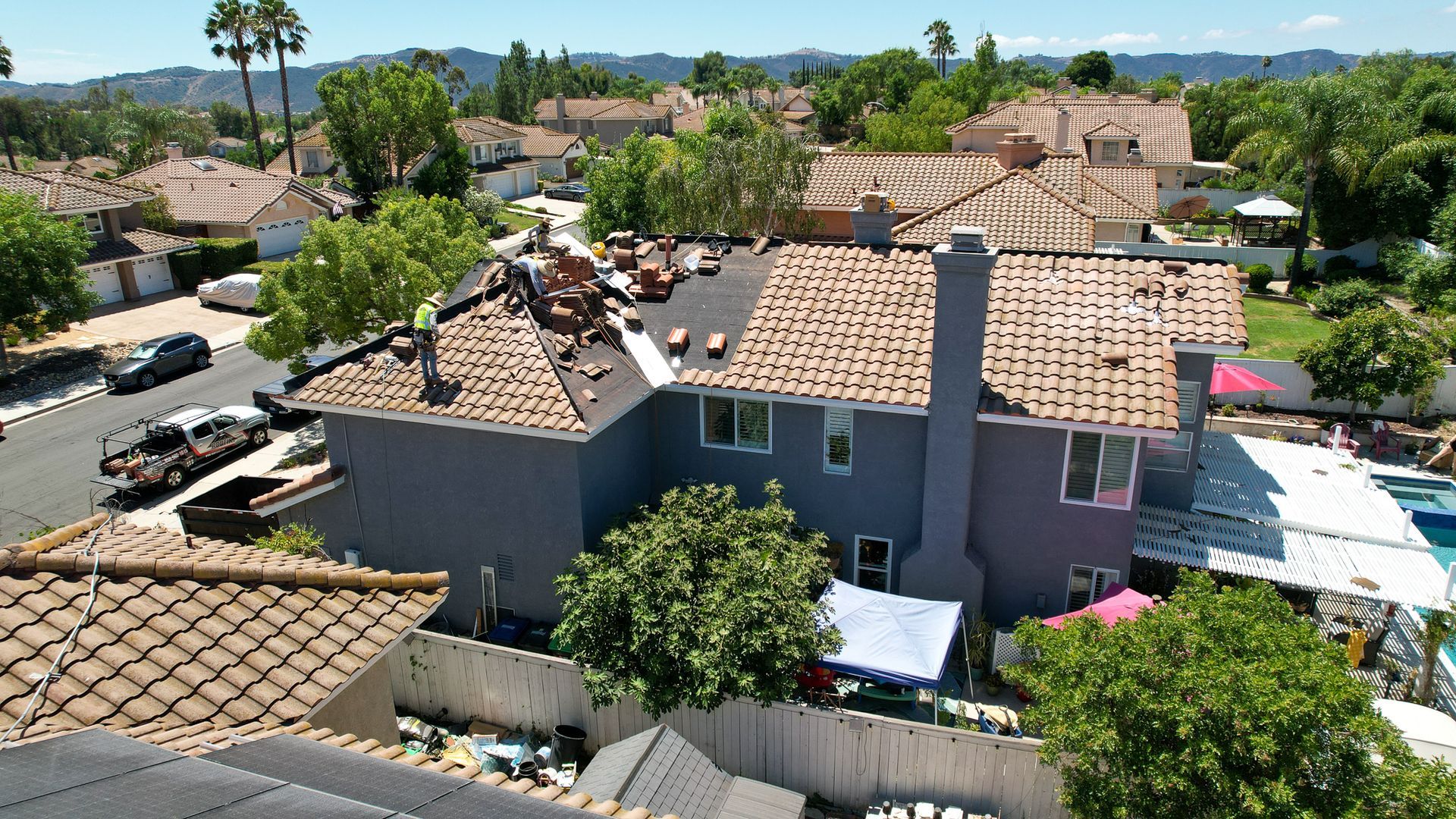 An aerial view of a house that is being remodeled