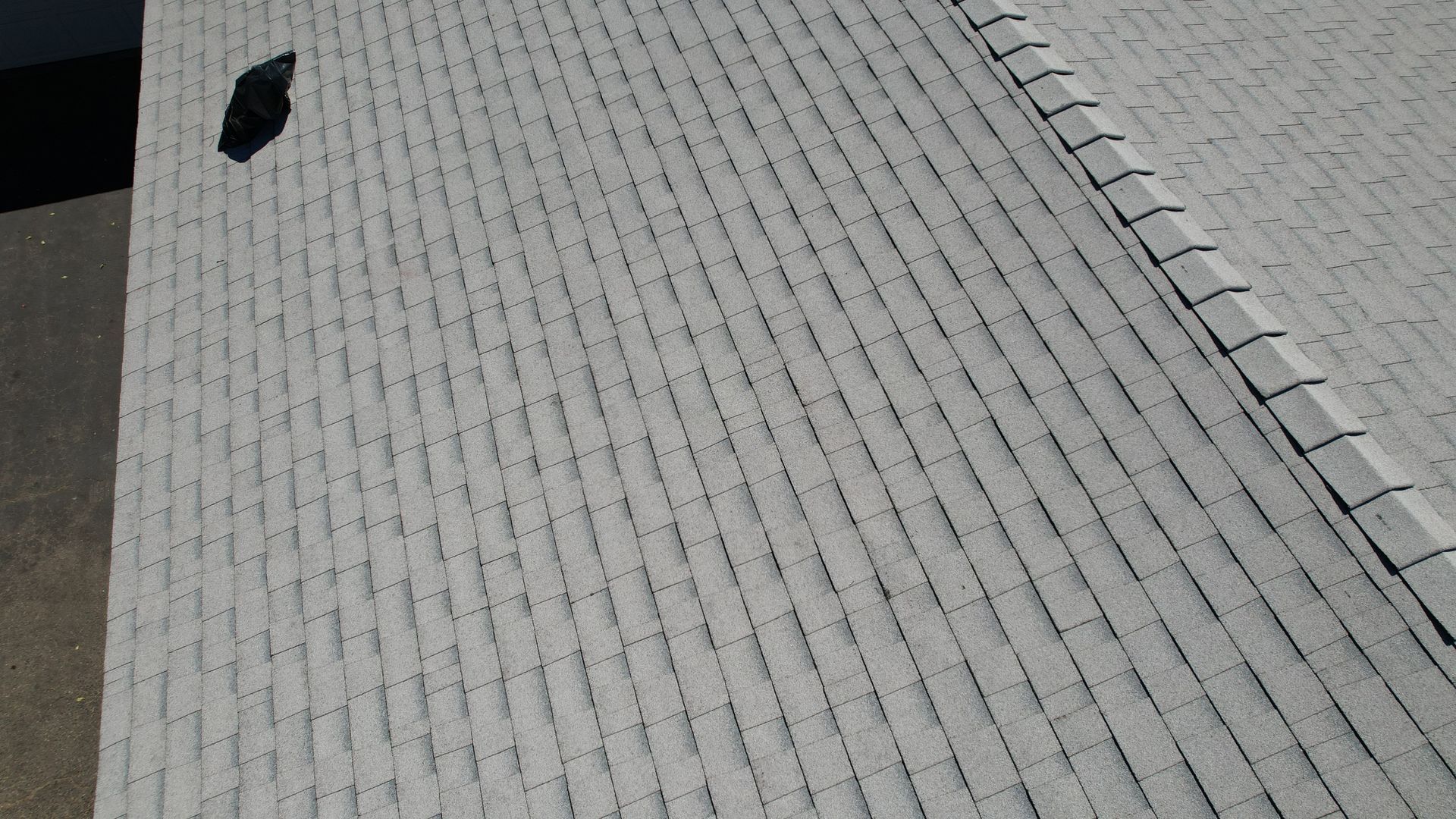 A close up of a carpet with a hole in it