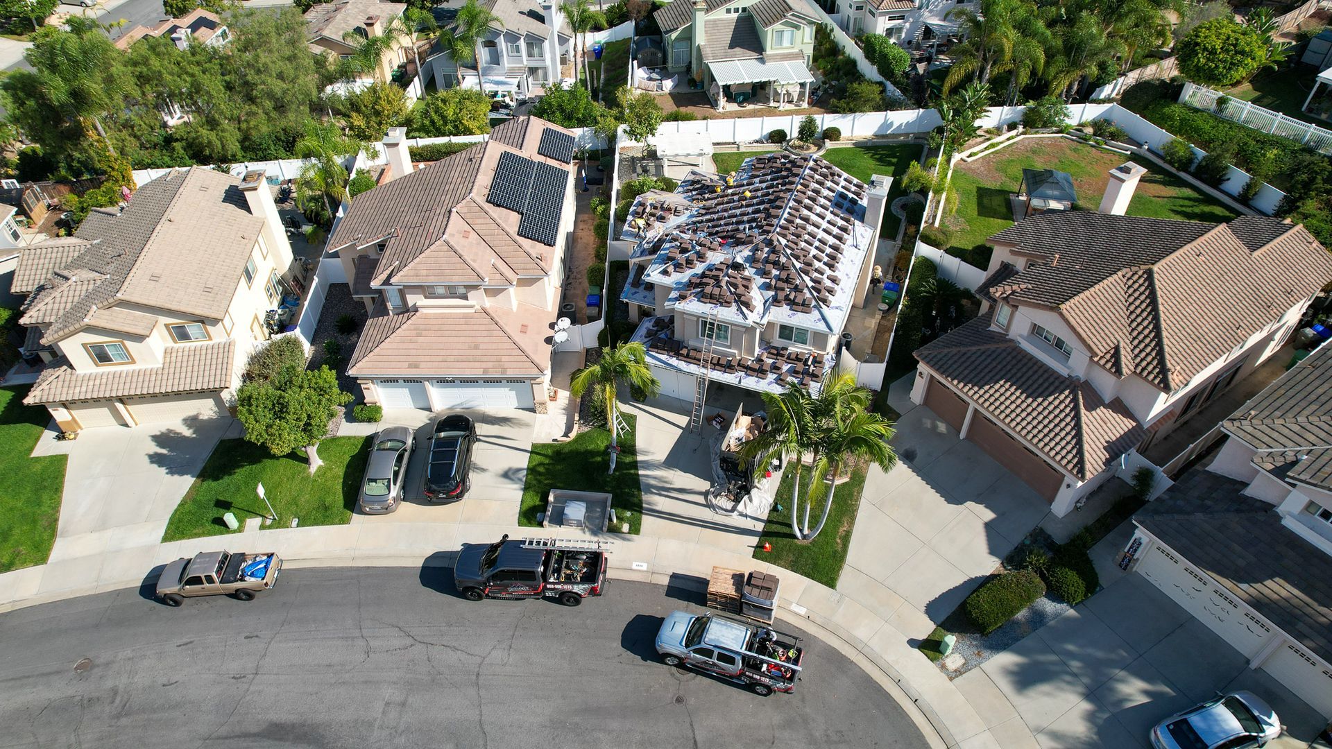 An aerial view of a residential area with lots of houses