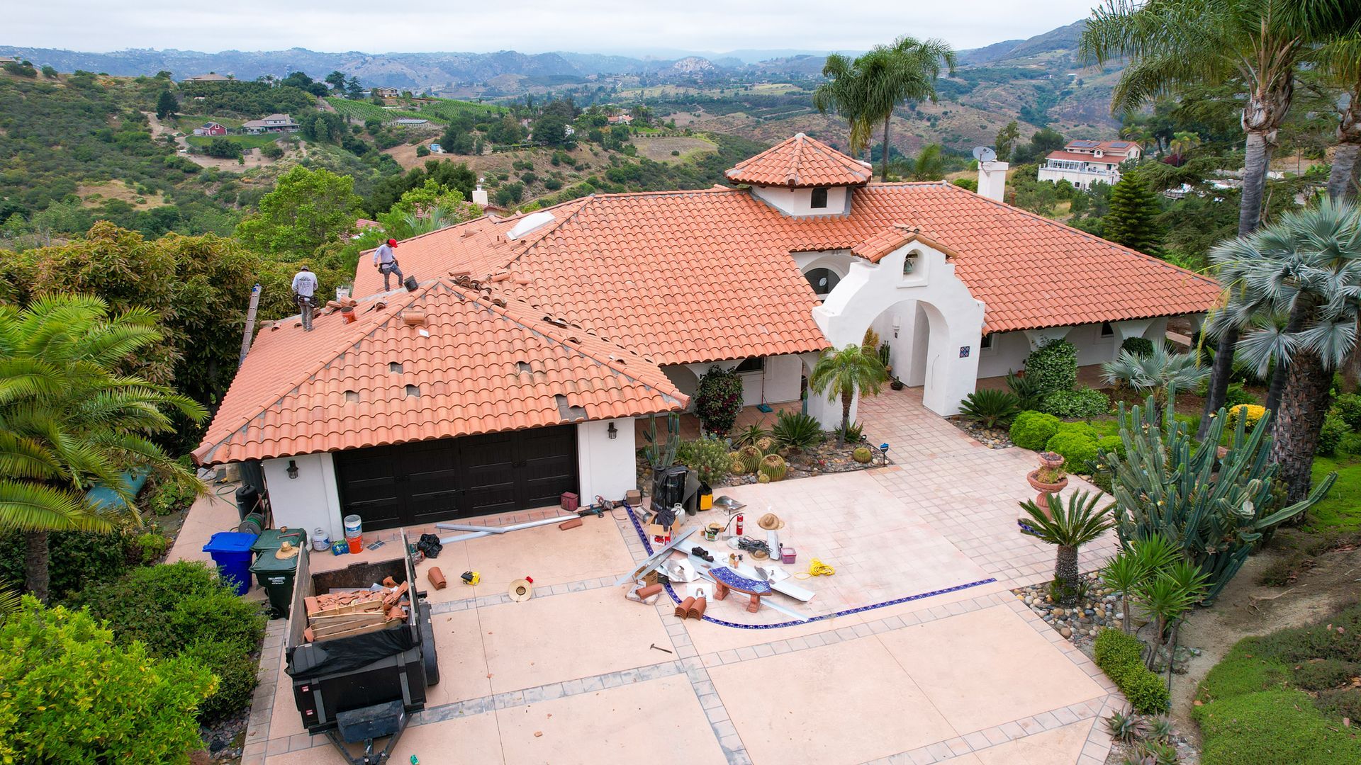 An aerial view of a house with a tiled roof