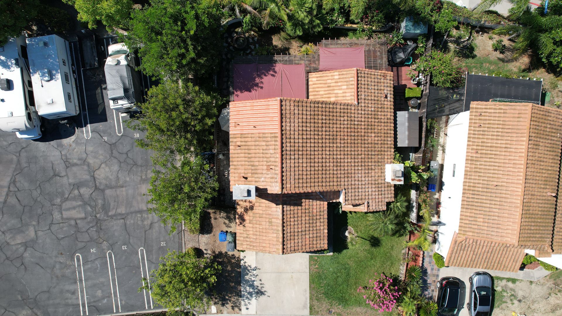 An aerial view of a house with a tiled roof