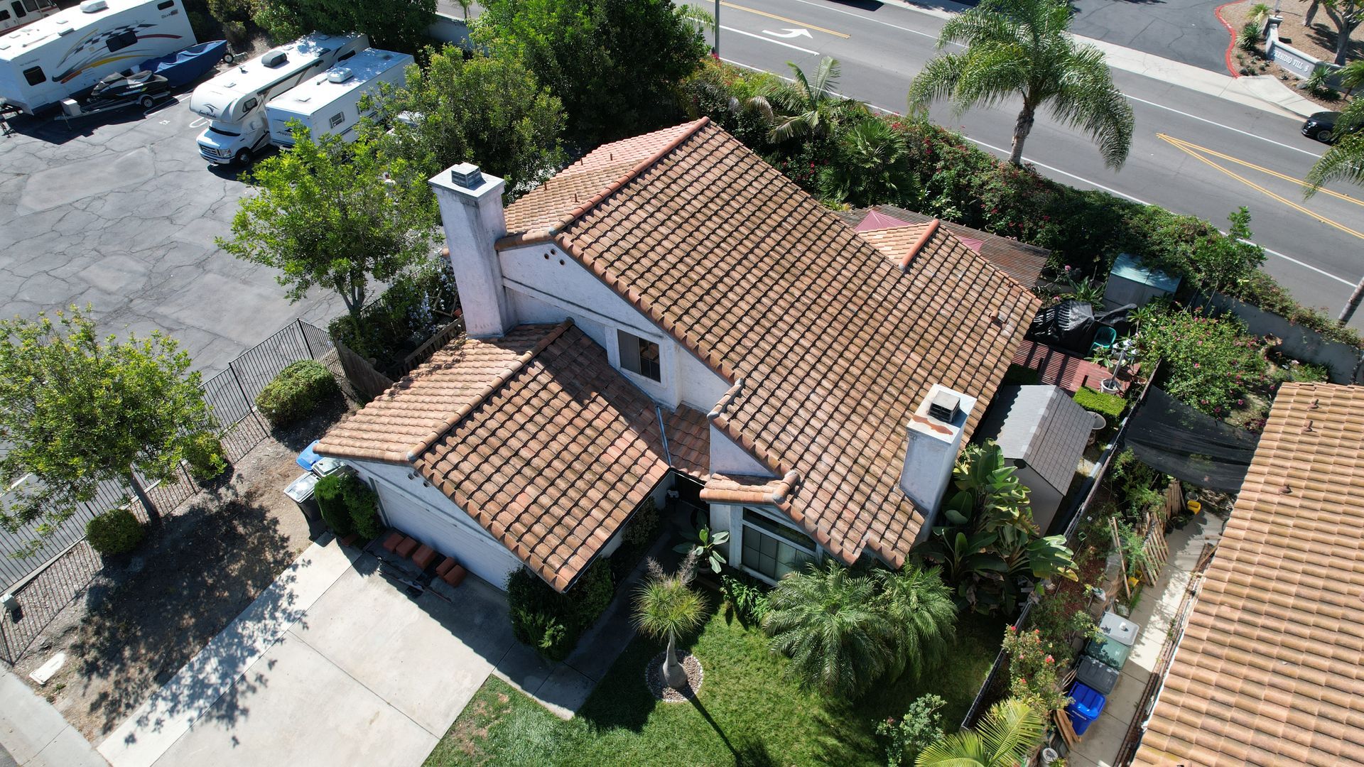 An aerial view of a house with a tiled roof