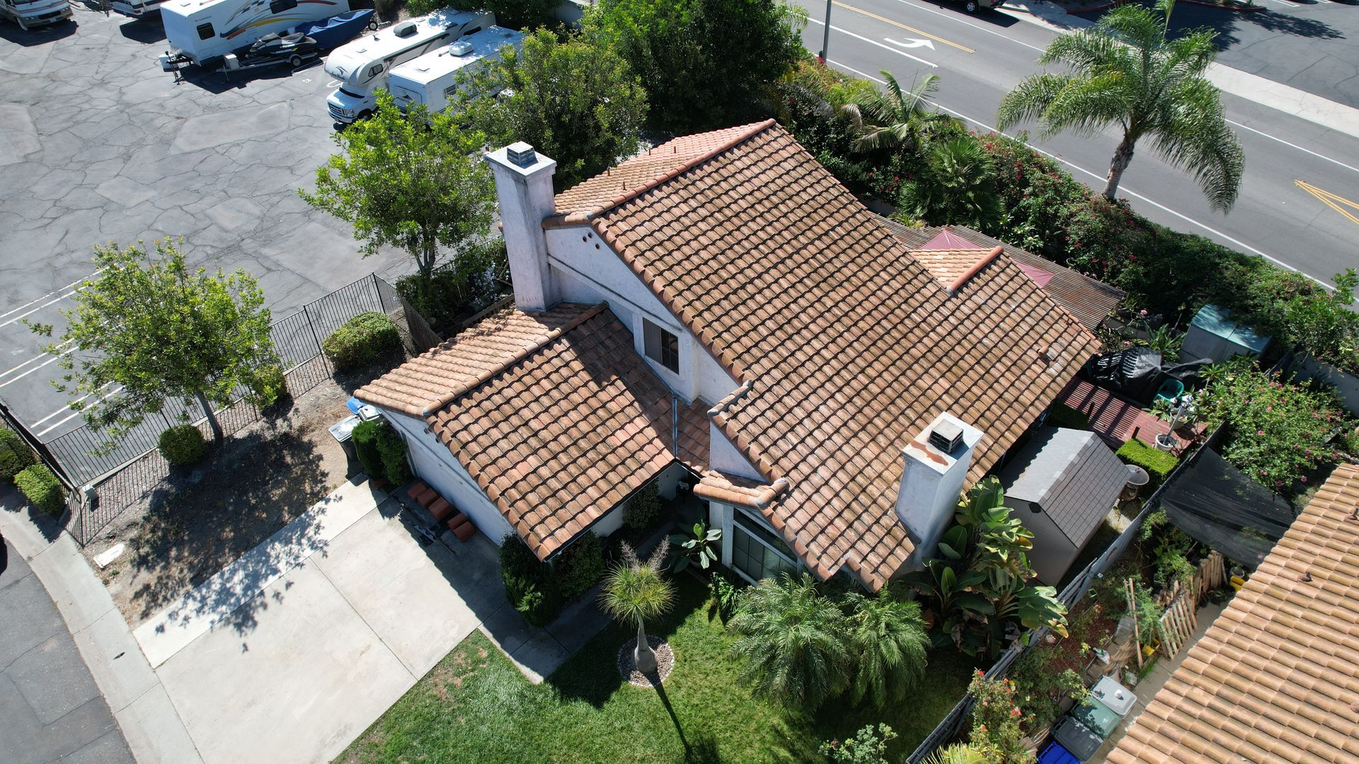 An aerial view of a house with a tiled roof