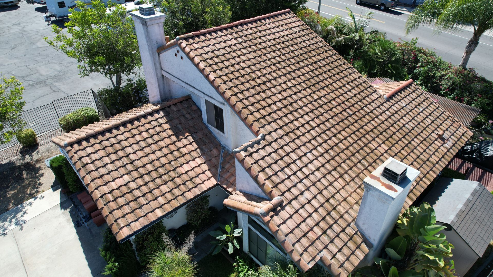 An aerial view of a house with a tiled roof