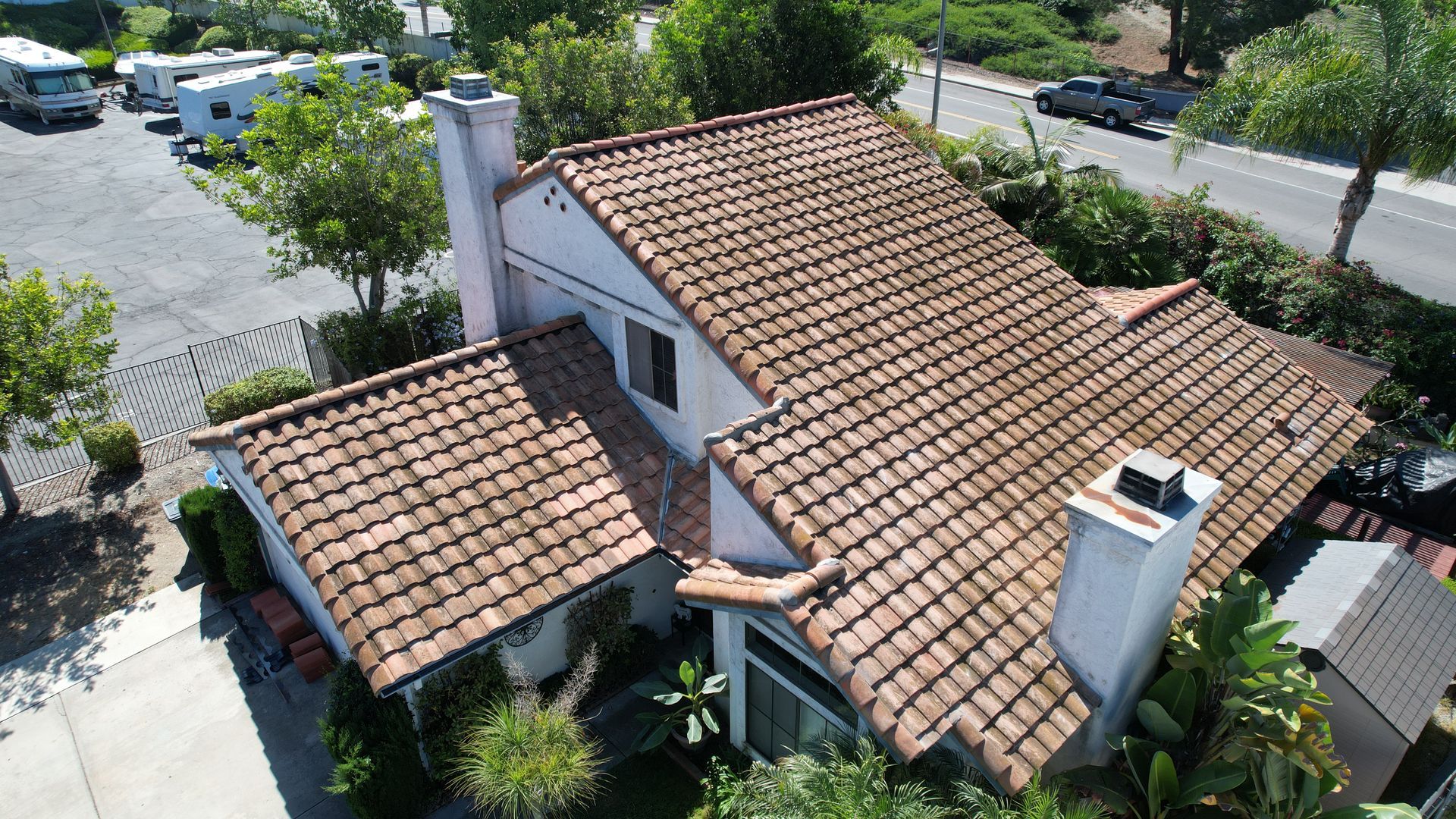 An aerial view of a house with a tiled roof