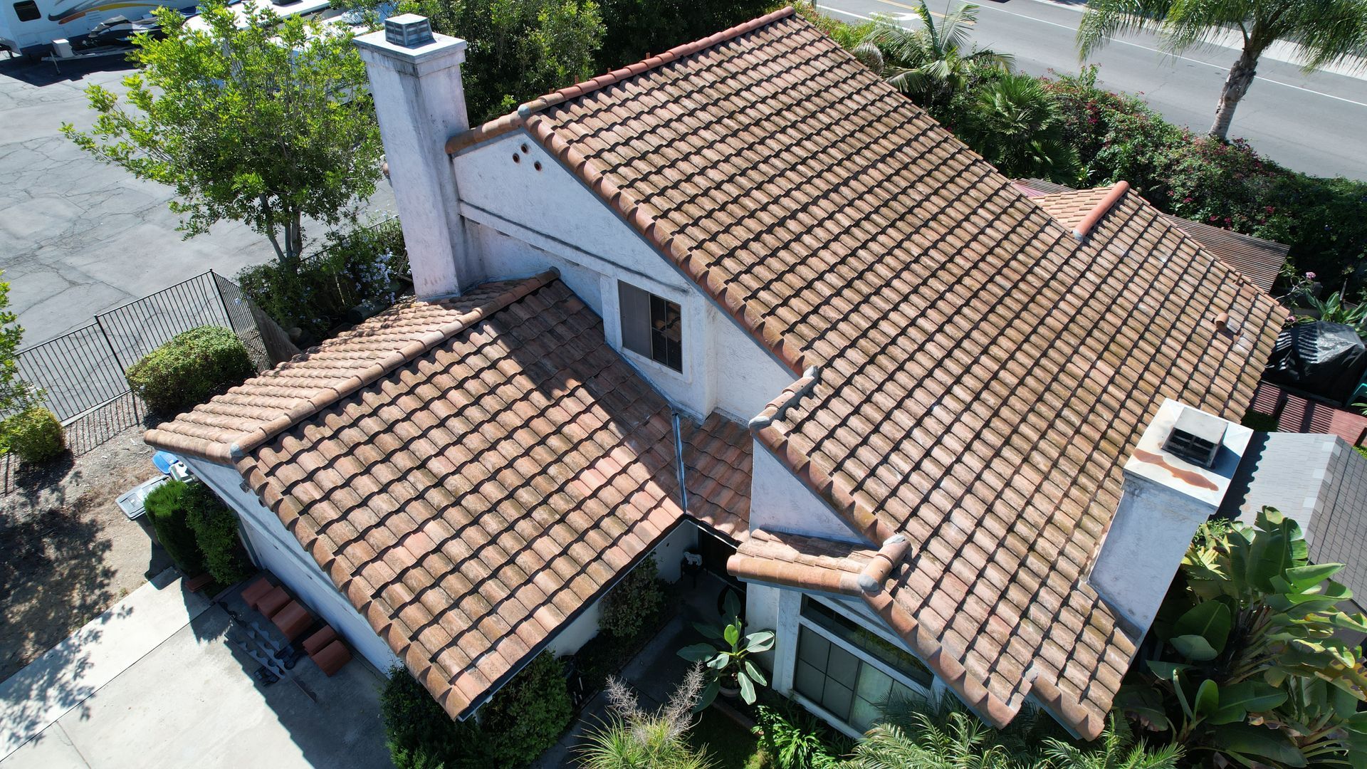 An aerial view of a house with a tiled roof