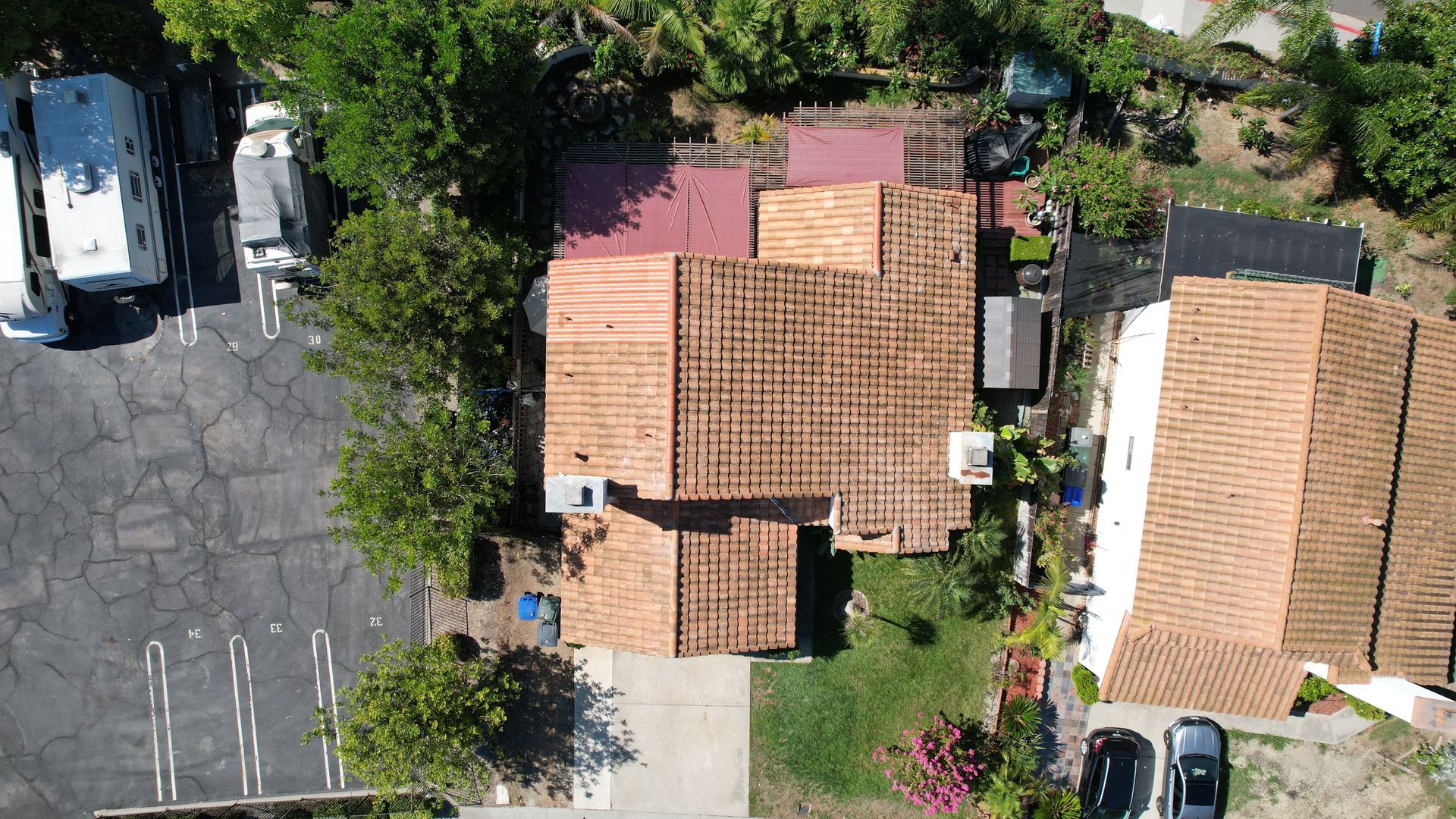 An aerial view of a house with a tiled roof