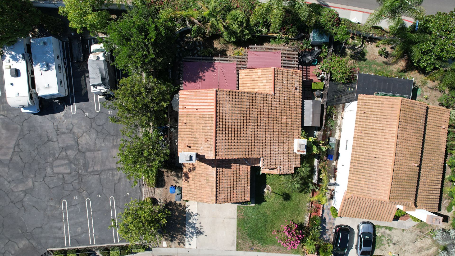 An aerial view of a house with a tiled roof