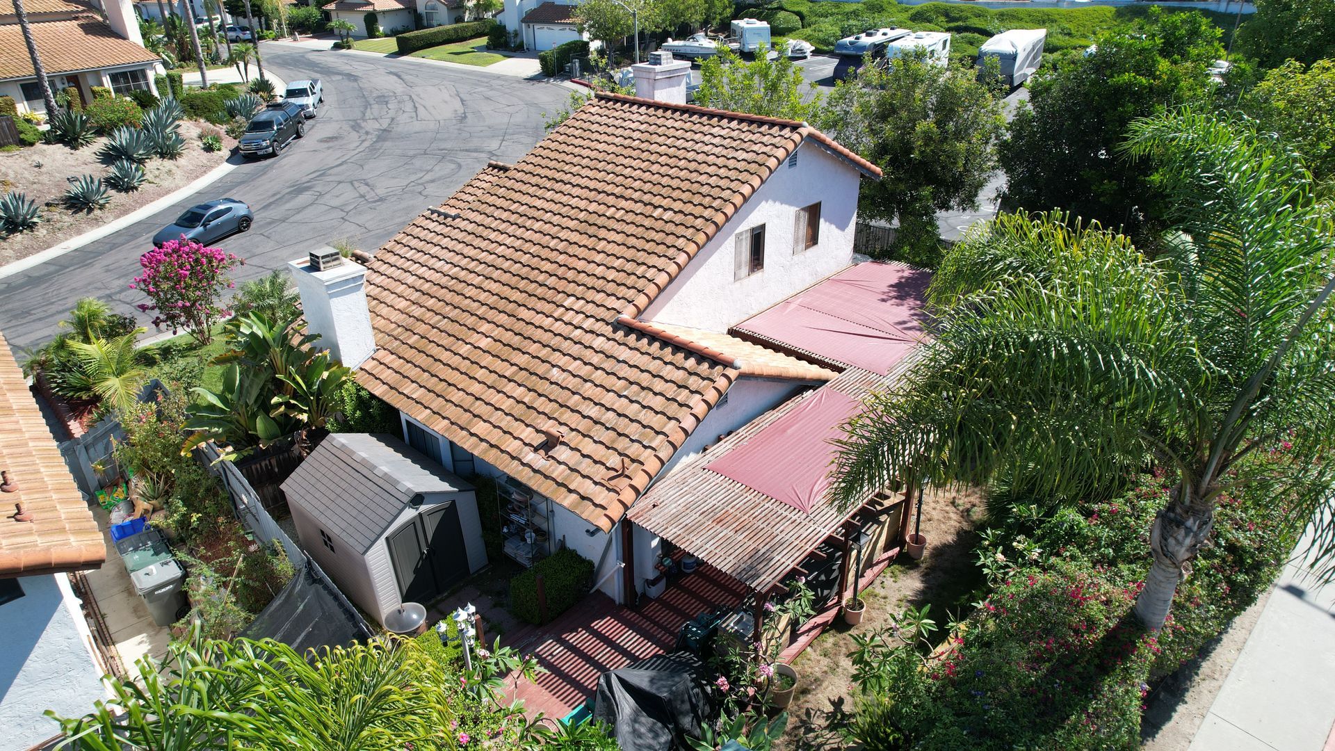 An aerial view of a house with a tiled roof