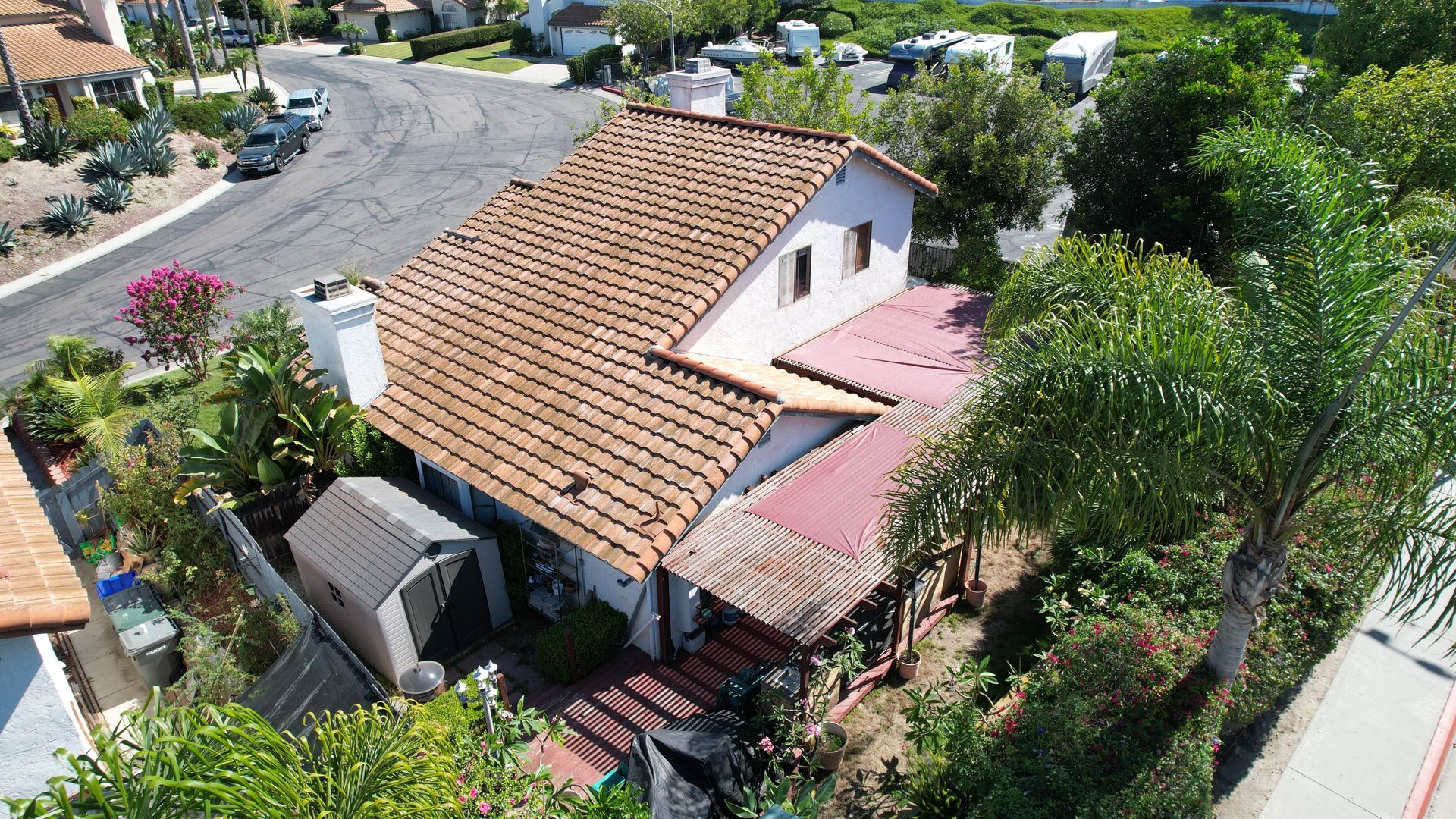 An aerial view of a house with a tiled roof
