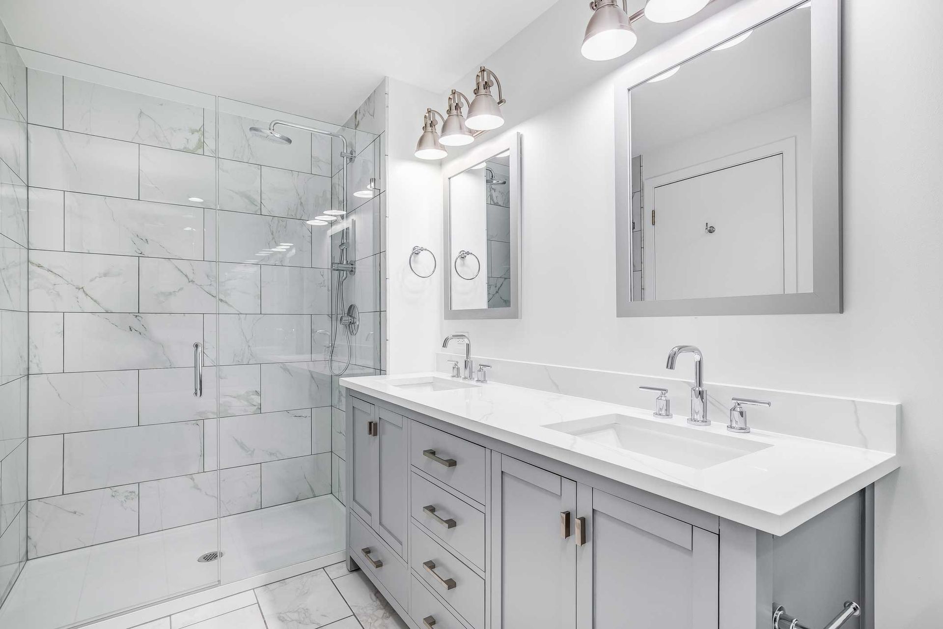 A bathroom with a grey cabinet and tiles — Atlanta, GA — HomeBook Pro Linx