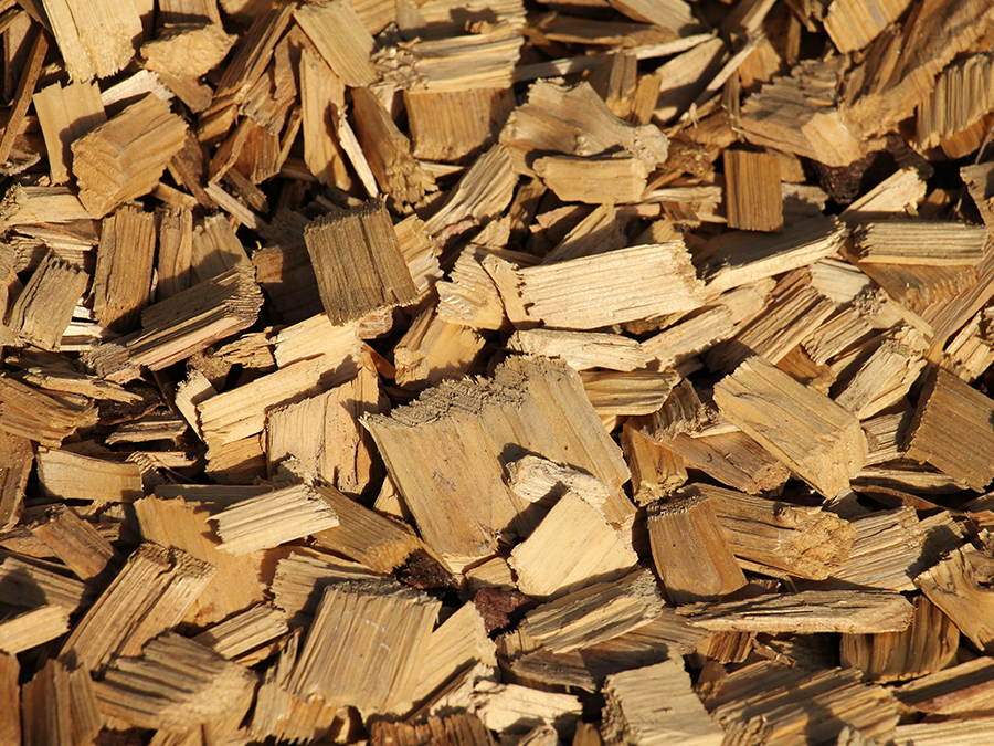 a pile of wood chips sitting on top of each other .