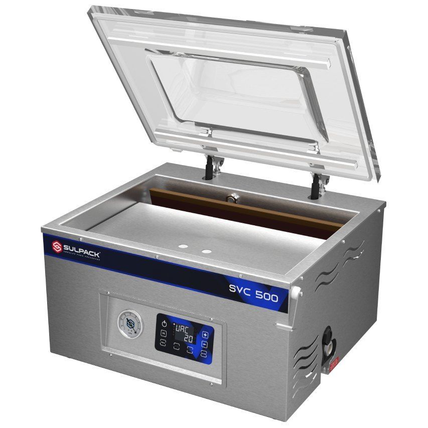 Uma seladora a vácuo de aço inoxidável com a tampa aberta.