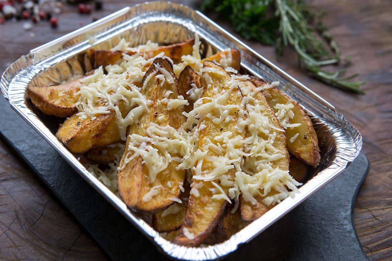 Batata Rústica com queijo do Restaurante Pimenta Rosa Gastronomia de Vinhedo - São Paulo da Chef Elisa Raimondi.