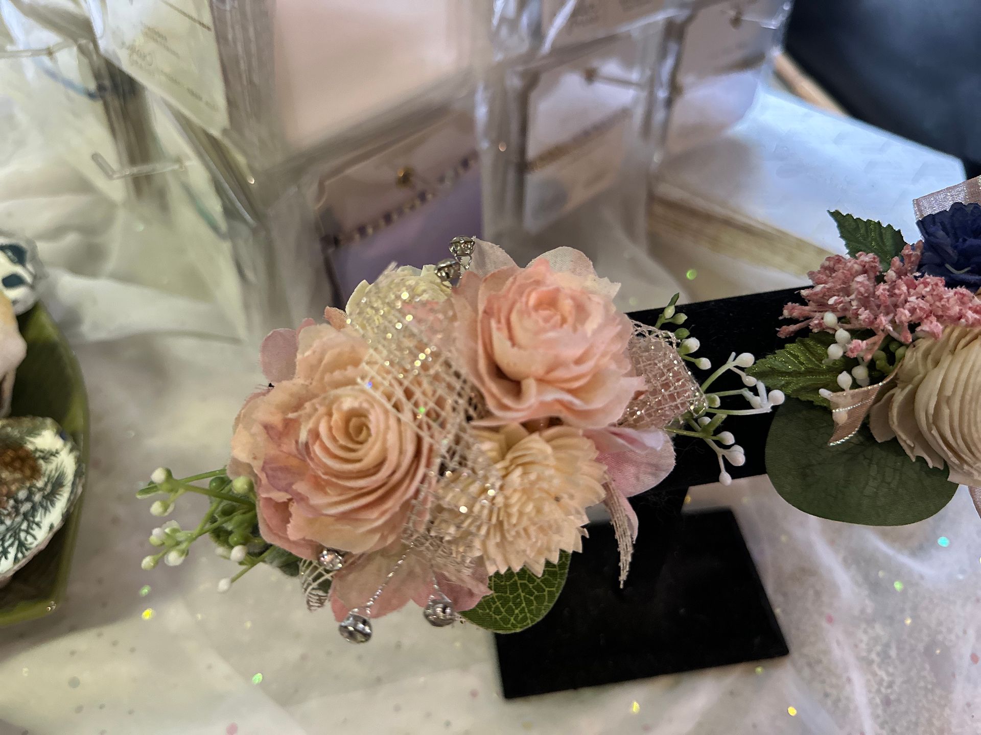 A close up of a bouquet of flowers on a table.