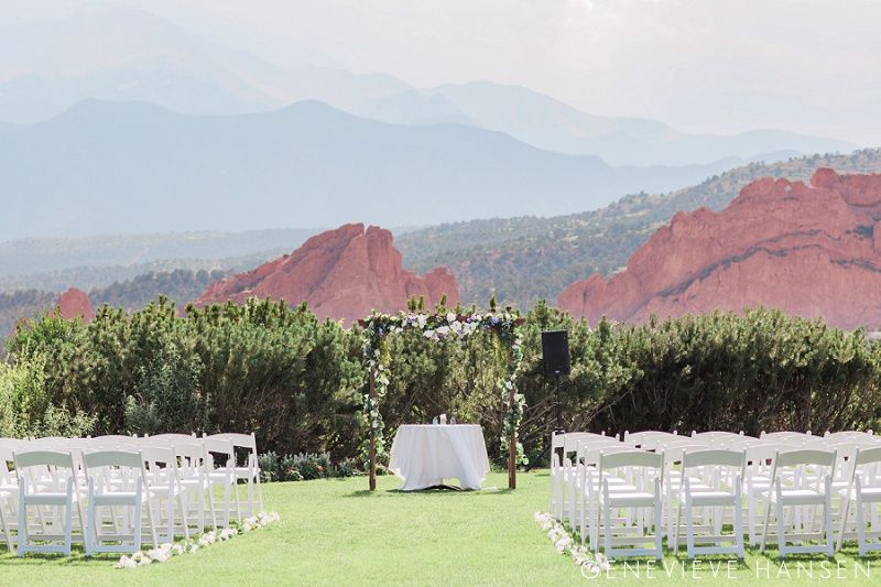 Wedding Ceremony AV Rental Setup with White Chairs and Scenic Mountain Backdrop in Colorado Springs