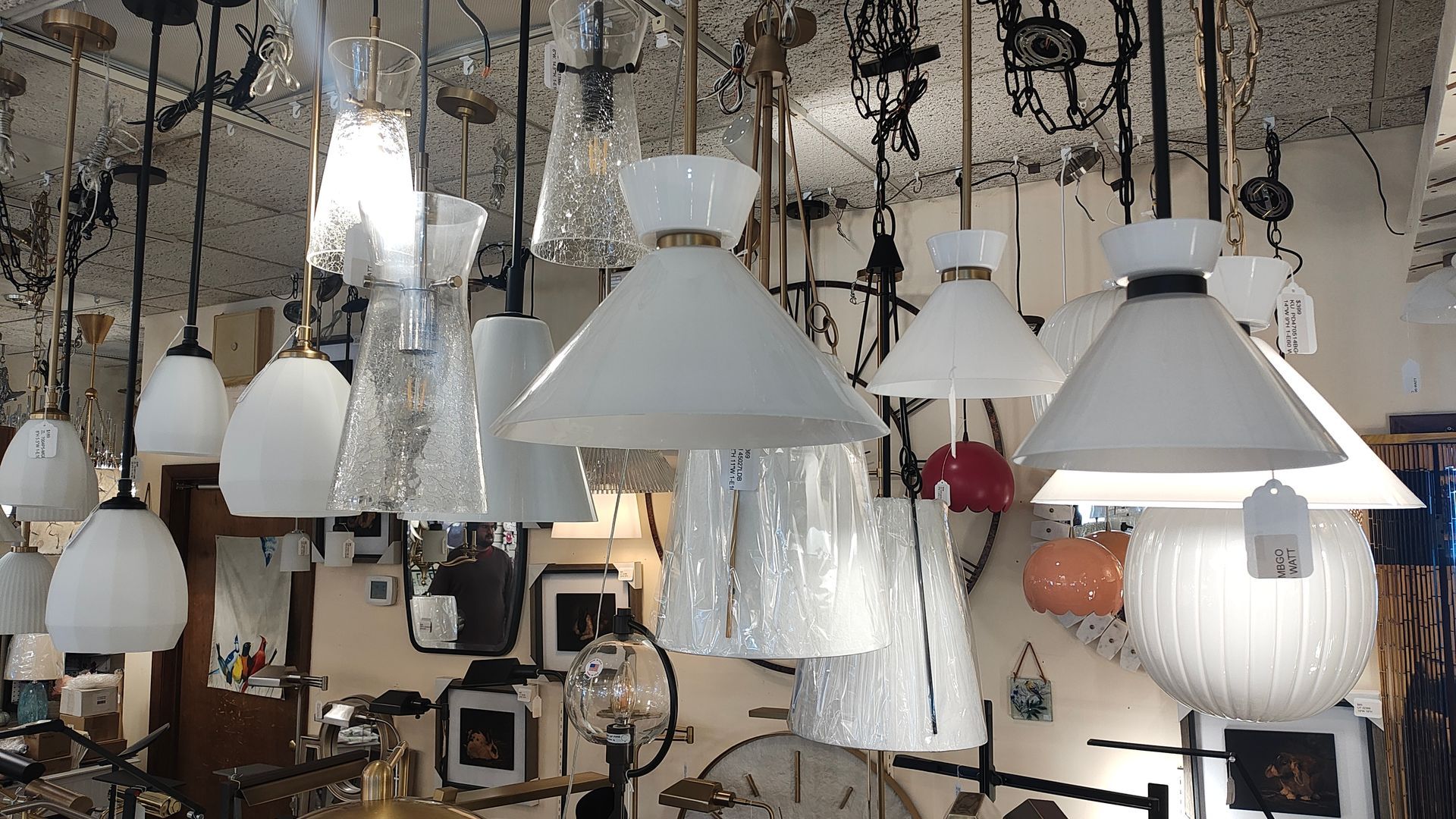 A room filled with lots of lamps with white shades in Avon, CT