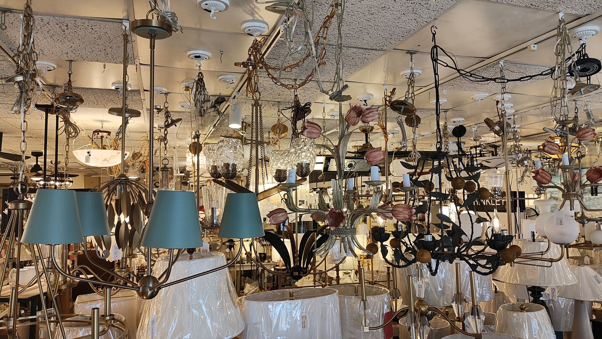 There are many different types of exterior lanterns hanging on a wall in Avon CT.