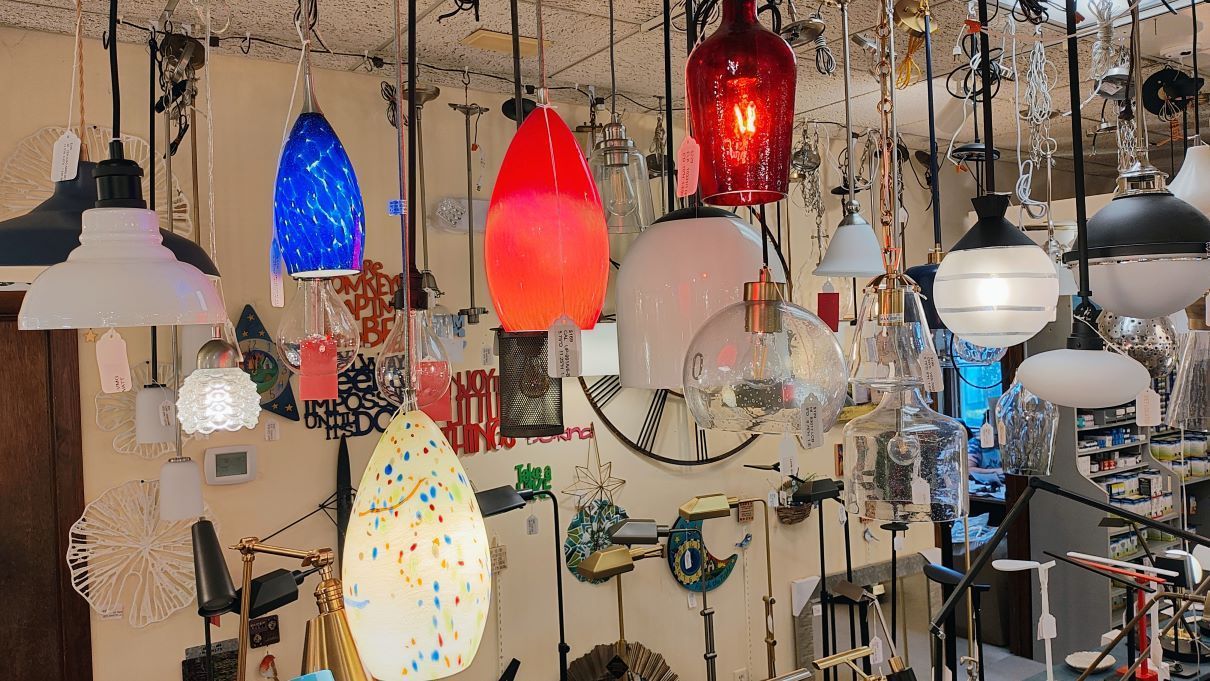 There are many different types of lights hanging from the ceiling. ct lighting local