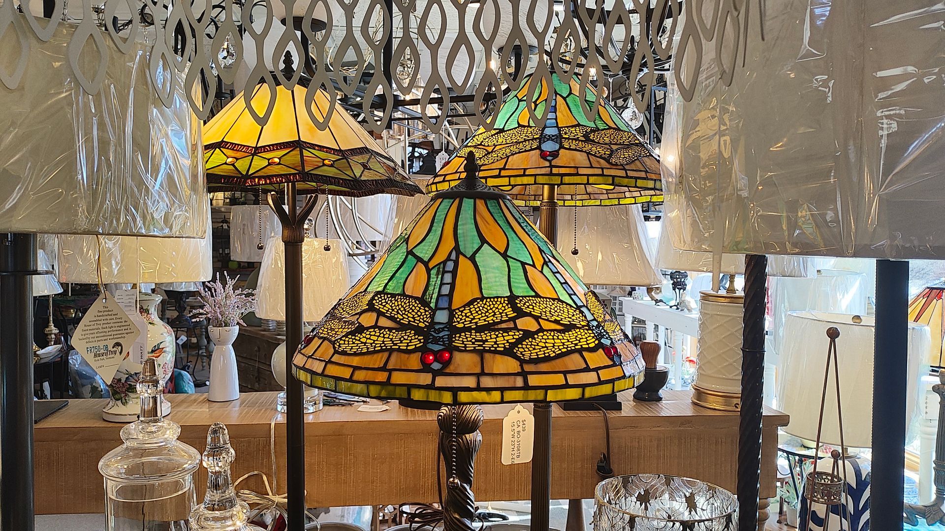 A bunch of lamps are lined up in a retail lighting store in Connecticut