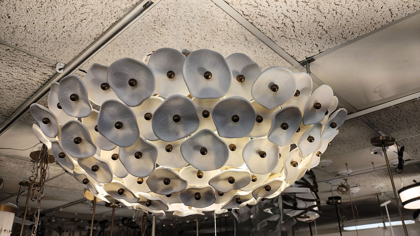 A room filled with lots of lamps with white shades in Avon, CT