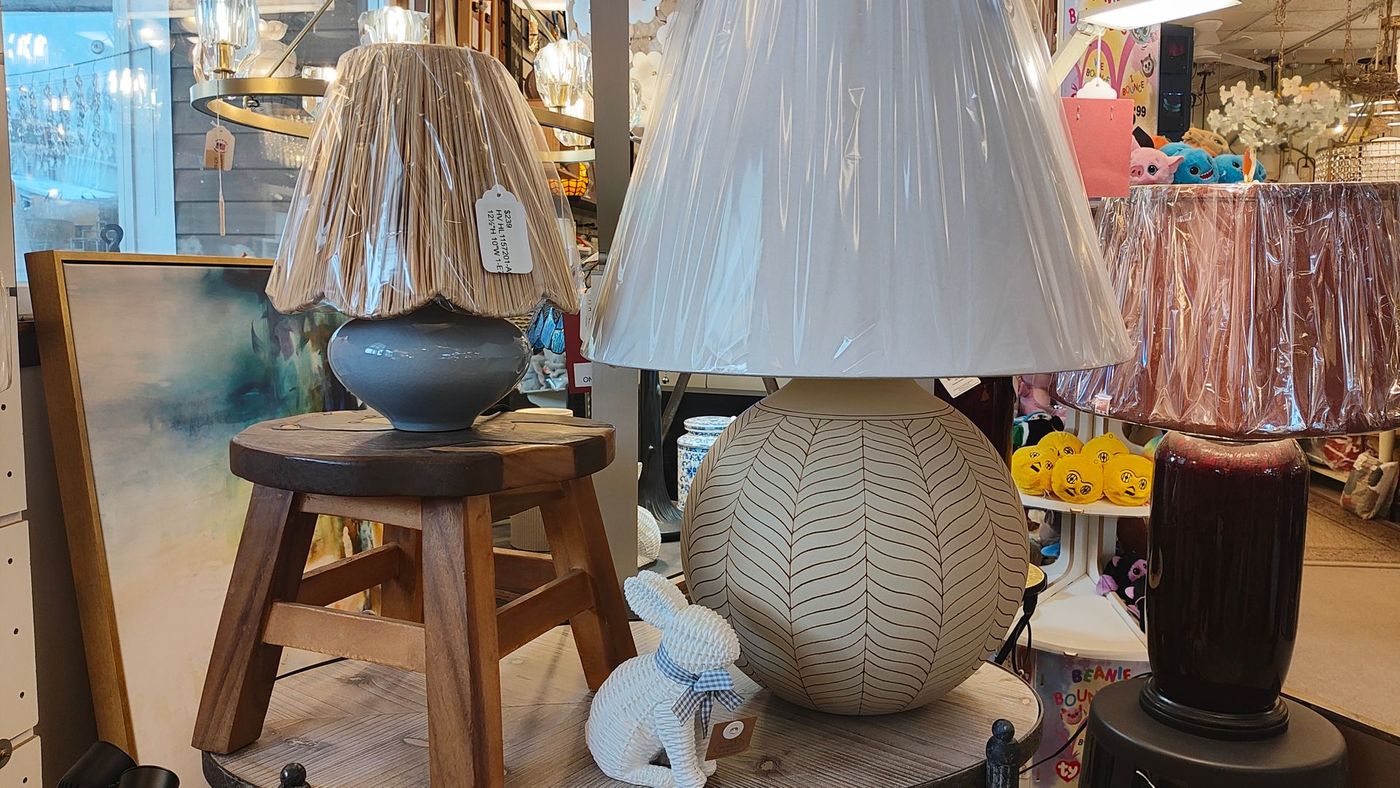 A selection of decorative lighting fixtures and lamps displayed in Avon, CT