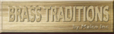 A wooden sign that says brass traditions on it