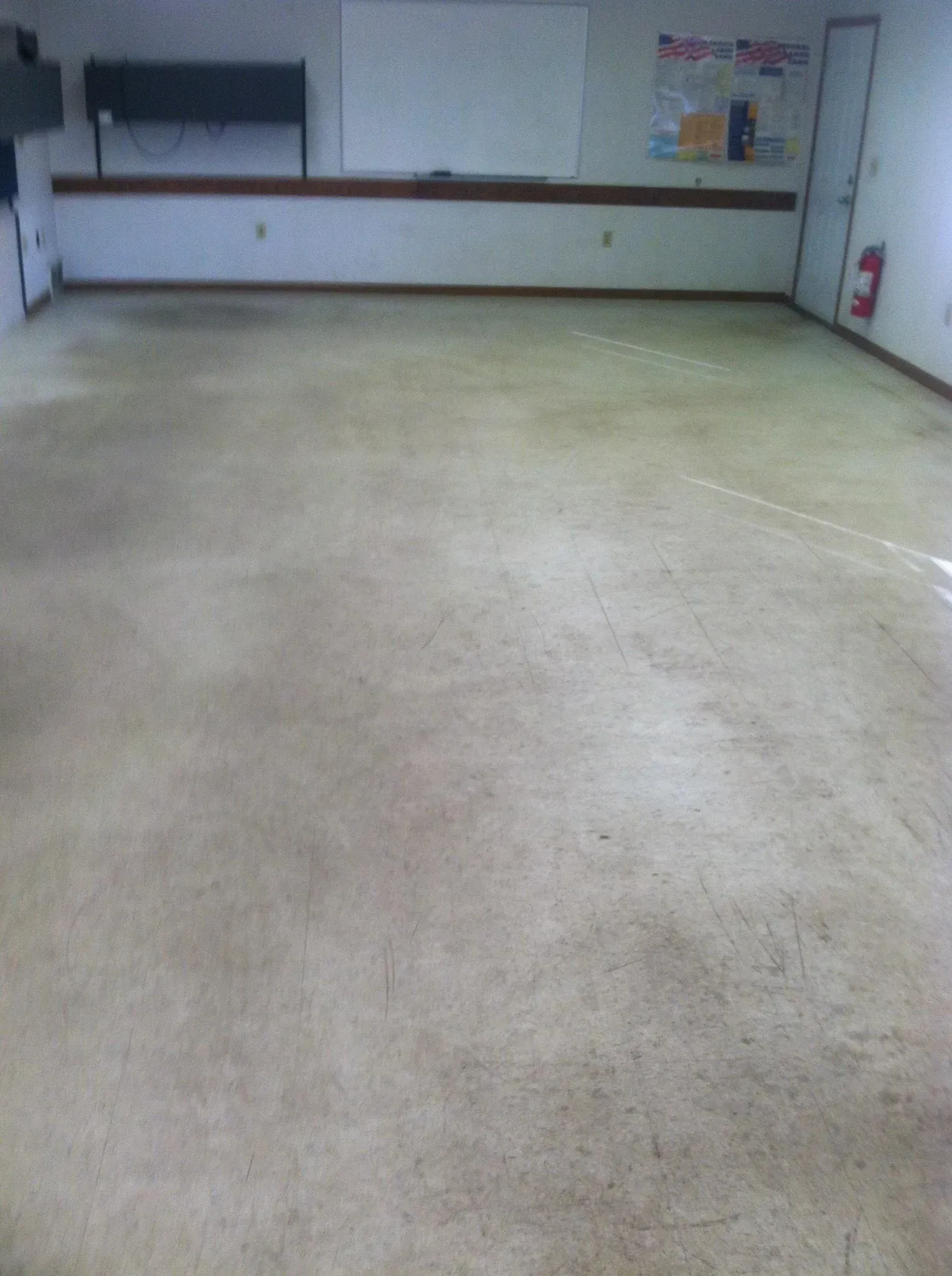 Empty room with beige carpet and white walls.