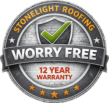 Pink Panther holding a checkered flag, Owens Corning logo, and 