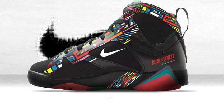 a pair of nike shoes with a colorful design on them