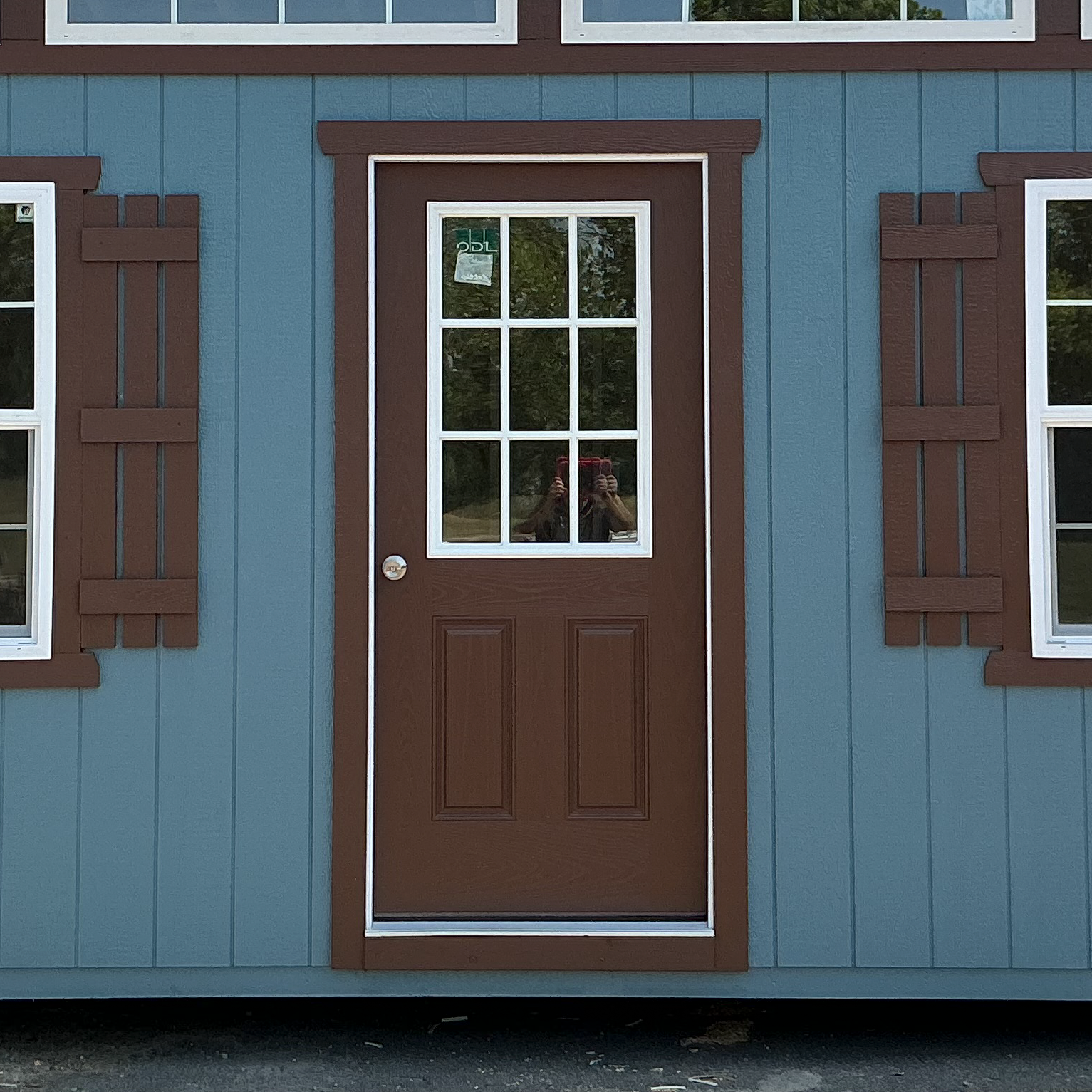 A white door with a handle on a white background.
