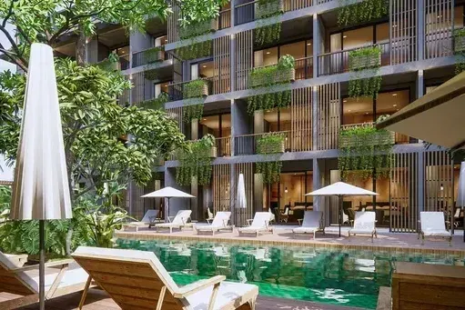 現代公寓大樓的泳池景觀，配有游泳池、躺椅和遮陽傘。