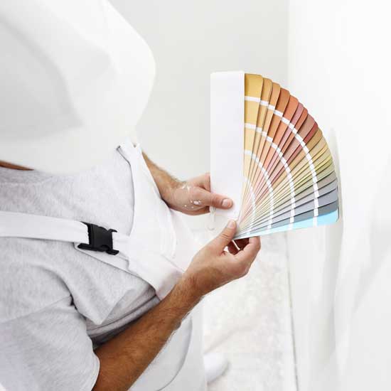 Painter man with color swatches — D & K Sharpen in, NSW