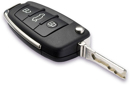 A close up of a car key on a white background