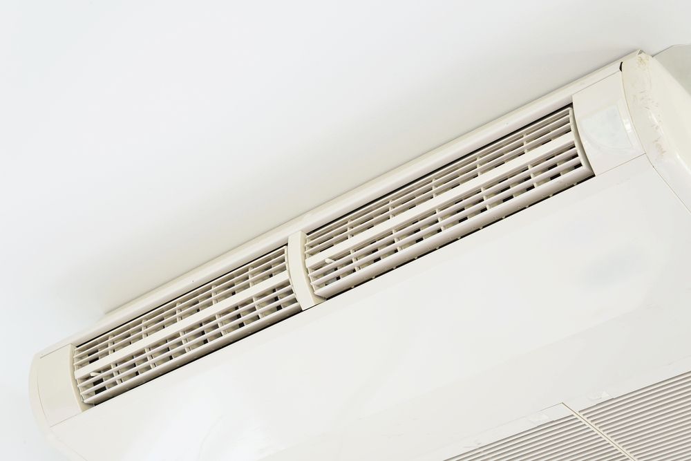 White Air Conditioning Unit Mounted on a White Ceiling — Climacool Air Conditioning in Redlynch, QLD