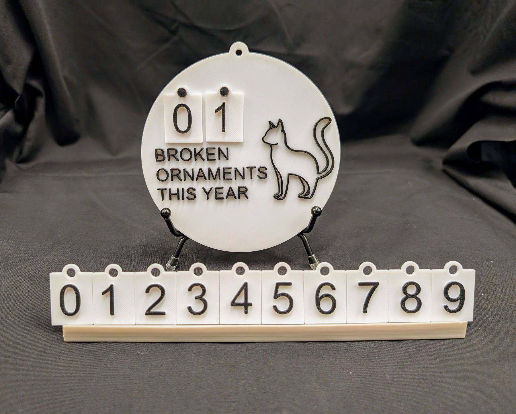 Broken ornament counter image with number tabs.