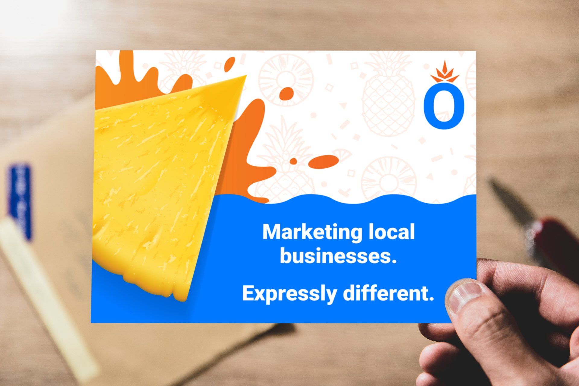 A person holding a postcard.