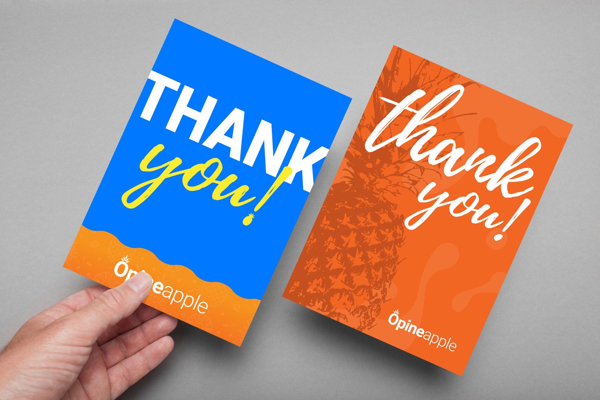 Two thank you cards on a table.