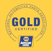 A gold certified napa autocare center logo on a yellow background