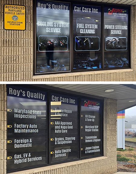 Exterior of Roy's Quality Car Care and Diagnostic Clinic; building with window signs listing services.