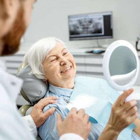 Family Dentistry — Elderly Woman Enjoying Her Smile in Fort Madison, IA