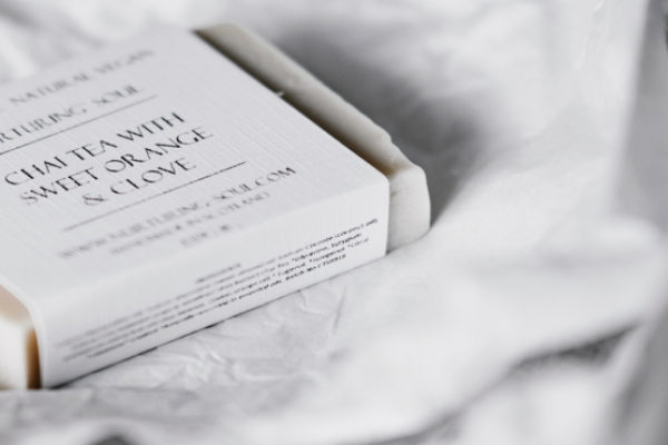 a bar of soap with the words chai tea with sweet orange and clove on it