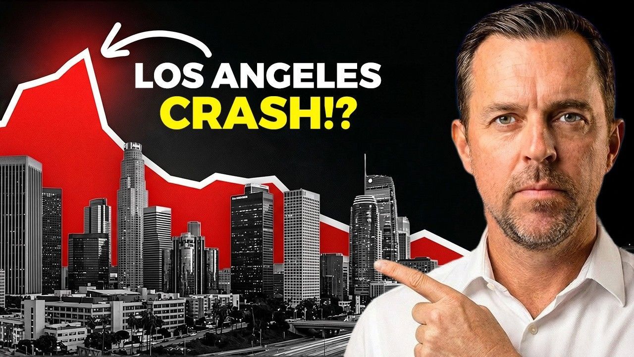 Los Angeles skyline with red chart line and “CRASH!?” text beside a man pointing at it