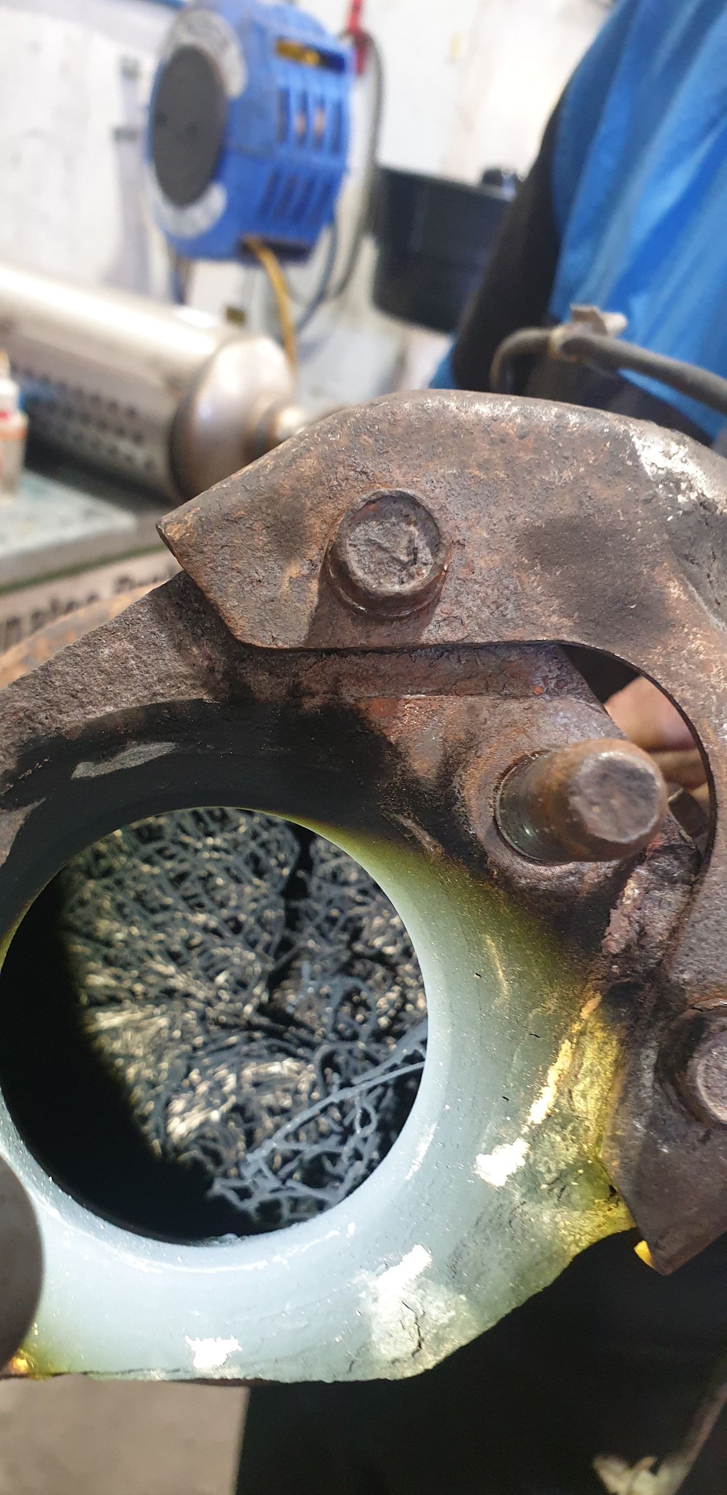 Close-up of a Rusted Metal Part With Bolts — R&B Automotive PTY LTD In Urangan, QLD
