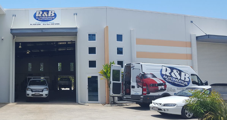 Exterior of Building With Vehicles. A Forklift, Van and Car Parked Out Front — R&B Automotive PTY LTD In Urangan, QLD