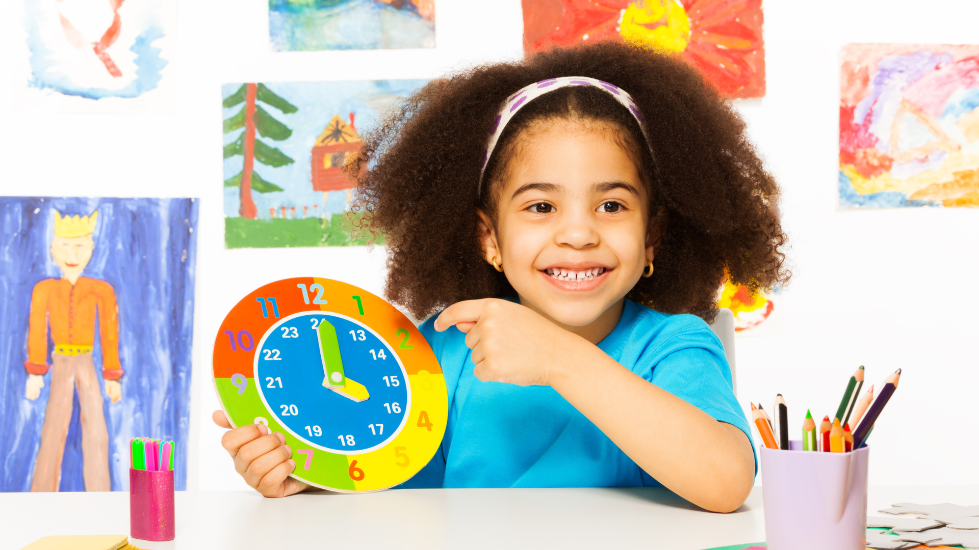 a young girl finishing her artwork on time demonstrating accountability
