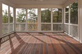 Screen Porches — Screened-In Porch with Empty Chair in Clayton, NC