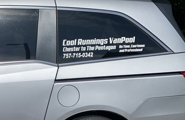 Silver minivan with "Cool Runnings VanPool" decal, offering rides from Chester to the Pentagon; 757-715-0342.
