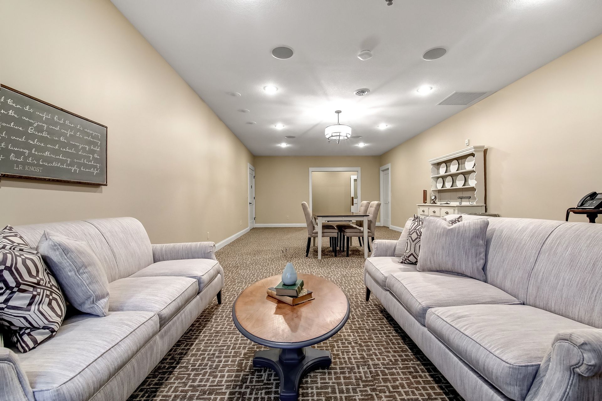 A living room with two couches and a table